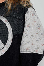 POL Peace Top with textured knit panels, and subtle floral-print accent - Black