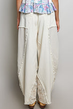 POL Designed in high rise wide pants in denim/twill with lace on top patch, outseam detail, floral metal button detail, solid color - Oatmilk.