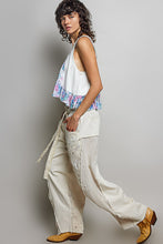 POL Designed in high rise wide pants in denim/twill with lace on top patch, outseam detail, floral metal button detail, solid color - Oatmilk.