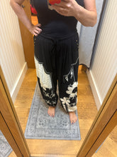 POL black pants, relaxed fit in rib with patch detail pointed solid pattern.