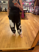 POL black pants, relaxed fit in rib with patch detail pointed solid pattern.