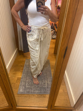 POL Designed in high rise wide pants in denim/twill with lace on top patch, outseam detail, floral metal button detail, solid color - Oatmilk.