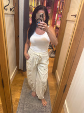 POL Designed in high rise wide pants in denim/twill with lace on top patch, outseam detail, floral metal button detail, solid color - Oatmilk.