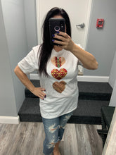 Love is in the air graphic tee