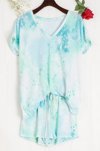 TIE-DYE PRINT TOP WITH A V NECKLINE, SHORT SLEEVES, AND VENTED HEM - Mint/Blue or Pink.