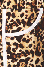 Leopard print, mid-rise shorts in a relaxed fit with an elastic waistband and side pockets.