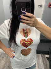 Love is in the air graphic tee