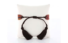 Six strand faceted metallic ab finish crystal beaded adjustable bracelet.