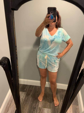TIE-DYE PRINT TOP WITH A V NECKLINE, SHORT SLEEVES, AND VENTED HEM - Mint/Blue or Pink.