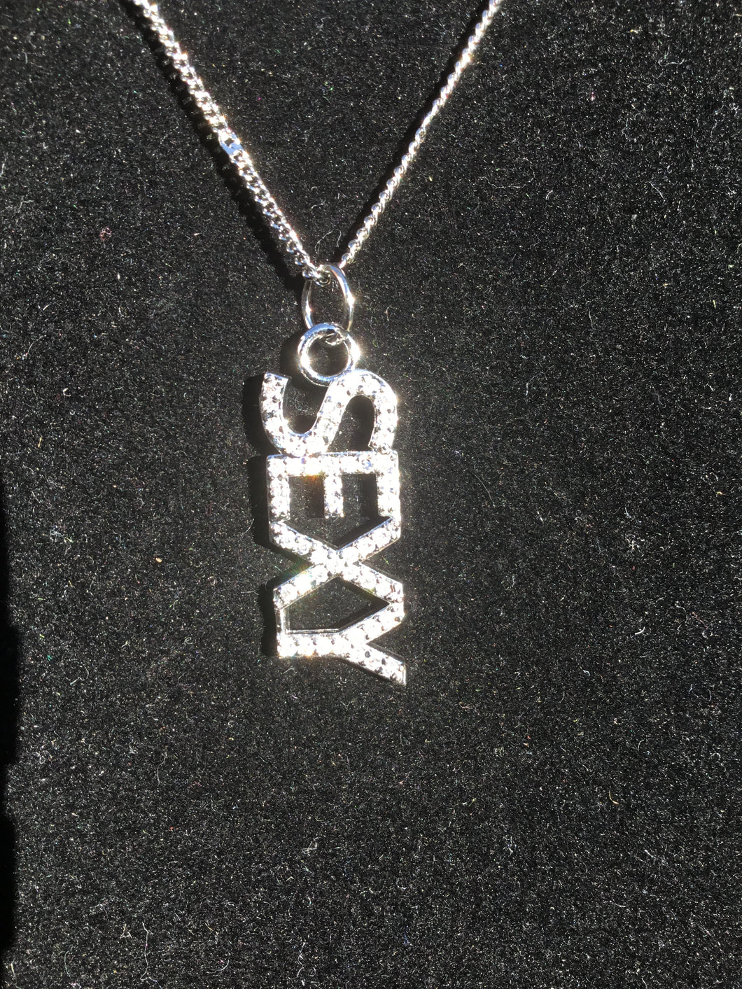 Sexy Rhodium Pendant on a Silver Adjustable Chain