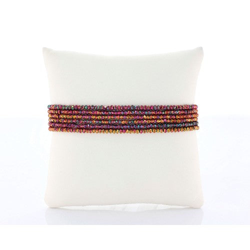 Six strand faceted metallic ab finish crystal beaded adjustable bracelet.